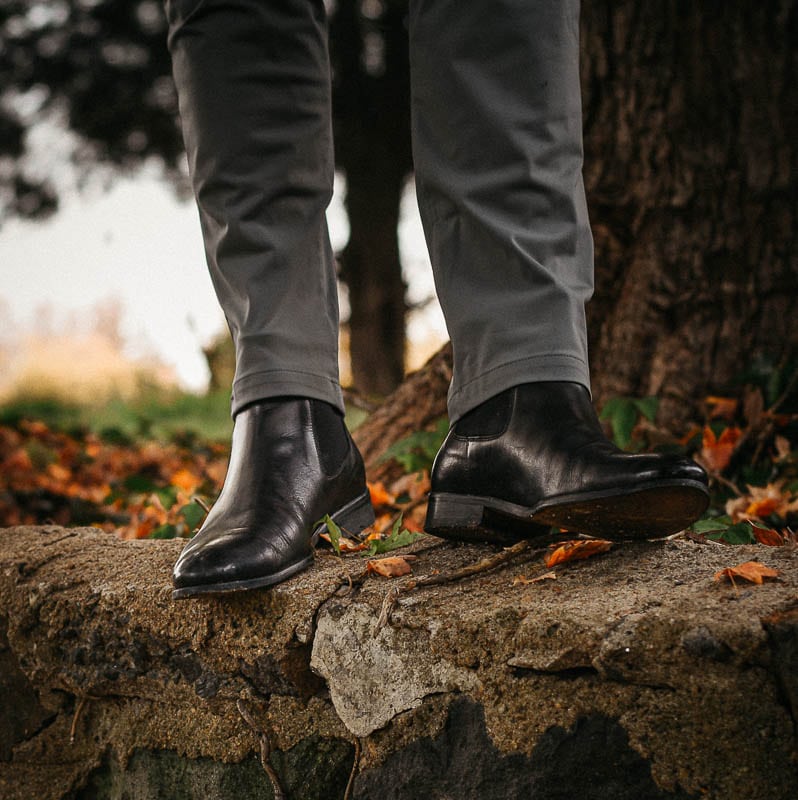 closeup ace marks chelsea boots with grey chinos