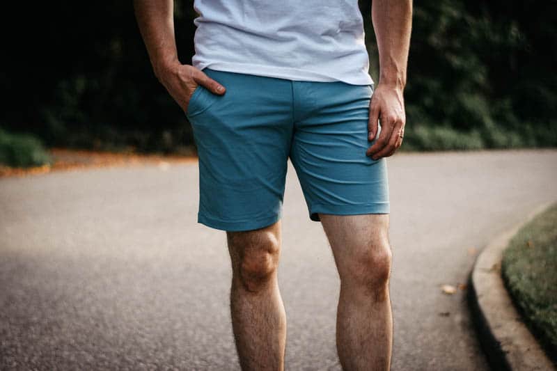 closeup of model wearing blue j crew dock shorts