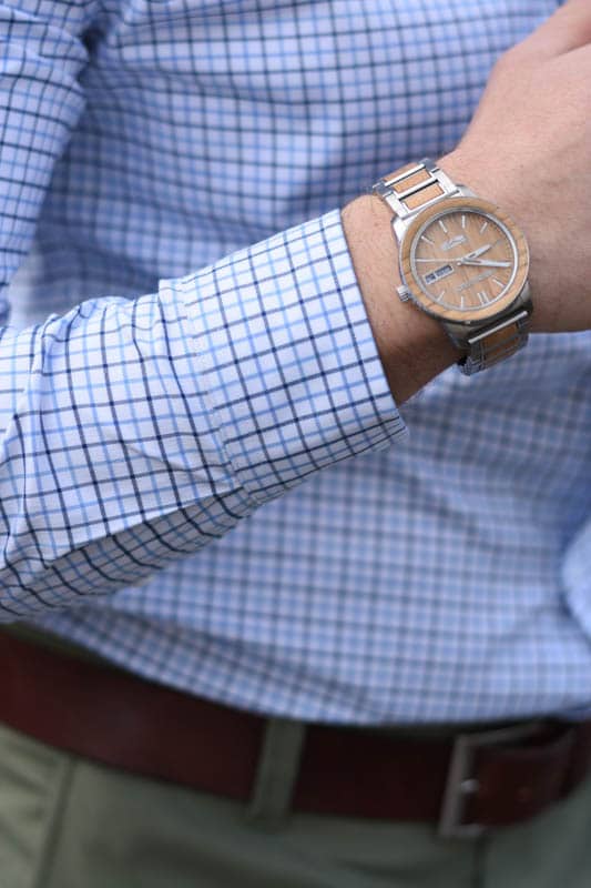 closeup of model wearing wooden watch