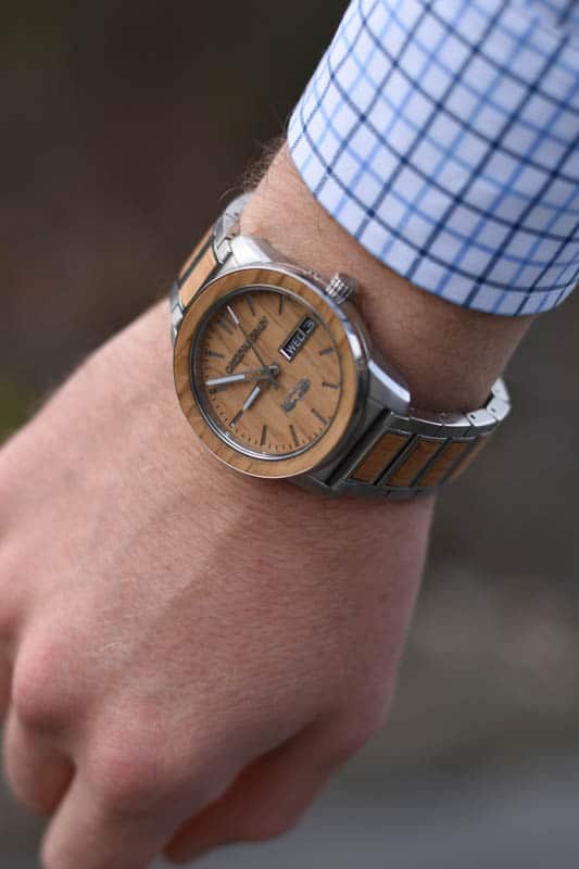 closeup of original grain barrel watch on wrist