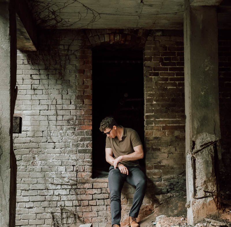 Falconeri outfit against brick wall