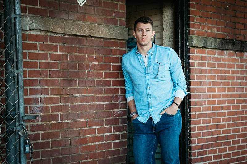 GAP model leaning against wall