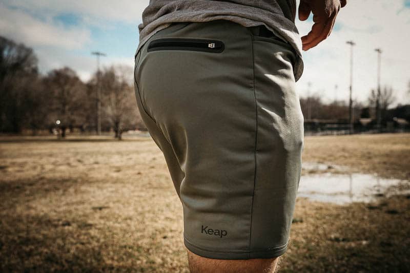 Keap active workout shorts in green back pocket