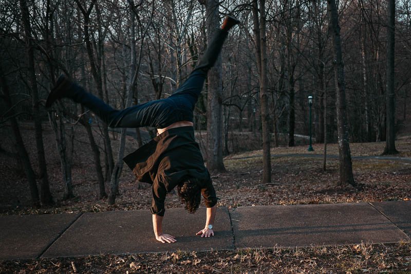 model doing cartwheel in The Perfect Jean