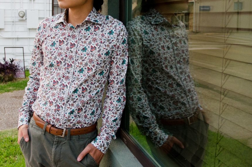 Model Wearing Apposta 100% Pure Cotton Poplin Floral And Leaning on Window