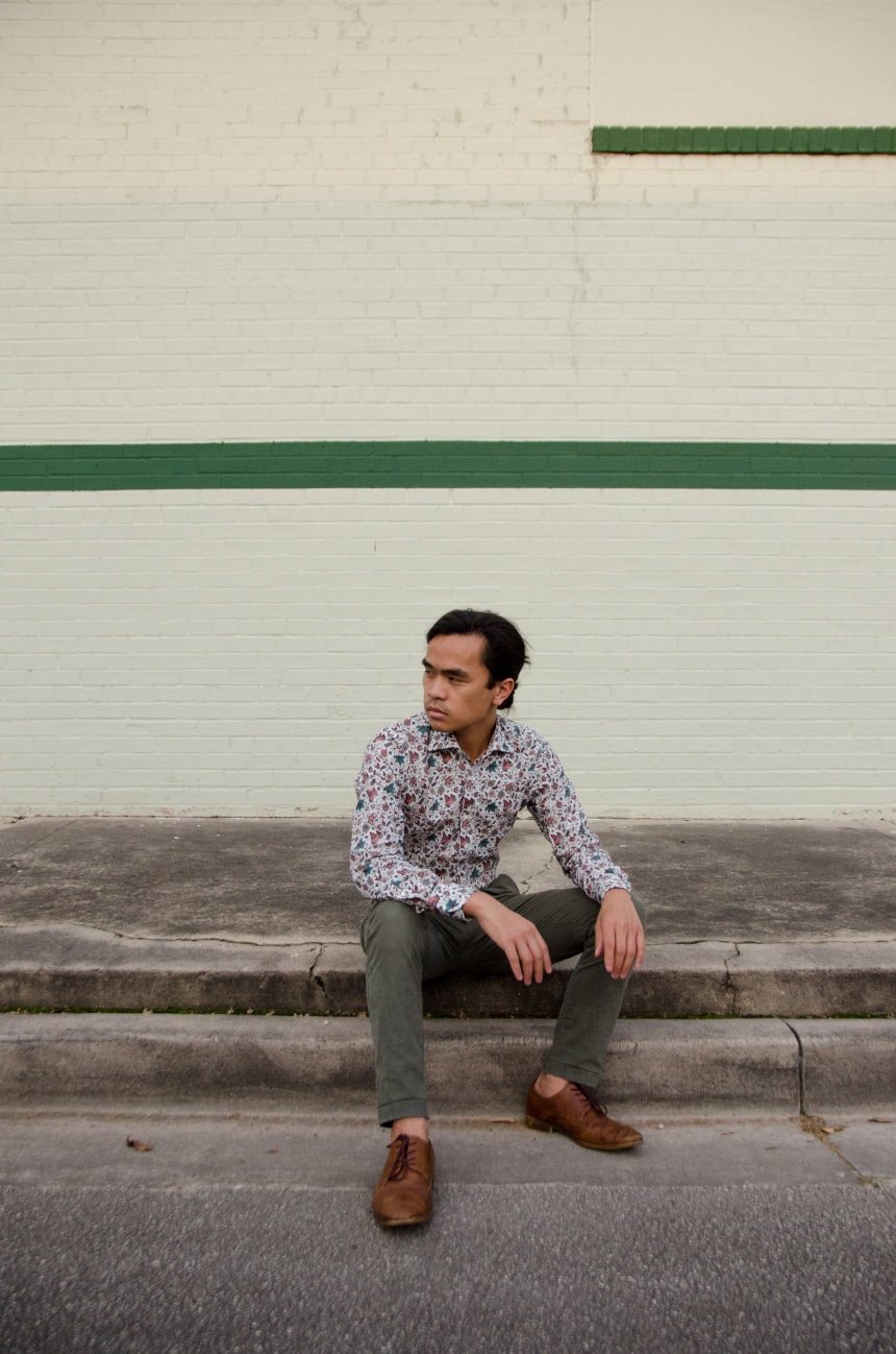 Model Wearing Apposta 100% Pure Cotton Poplin Floral And Sitting On Street