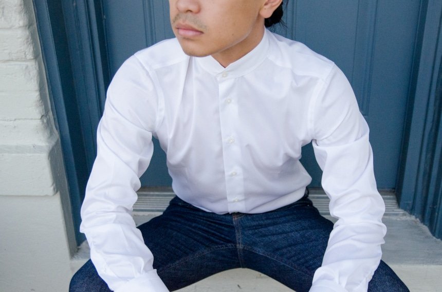 Model Wearing Apposta Coolmax Twill and Sitting On Stoop Close Up