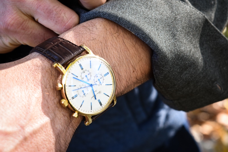 model wearing bjorn hendal white dial varberg chronograph