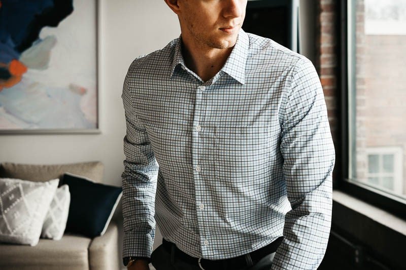 Model wearing dress shirt with tommy john undershirt not showing through 1