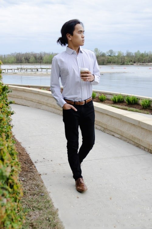 Model Wearing Mizzen+Main Kennedy Dress Shirt Standing Up and Holding Coffee