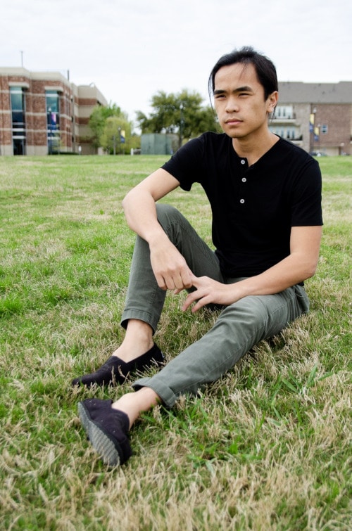 Model Wearing Mizzen+Main Tohono Henley Sitting Down in Park