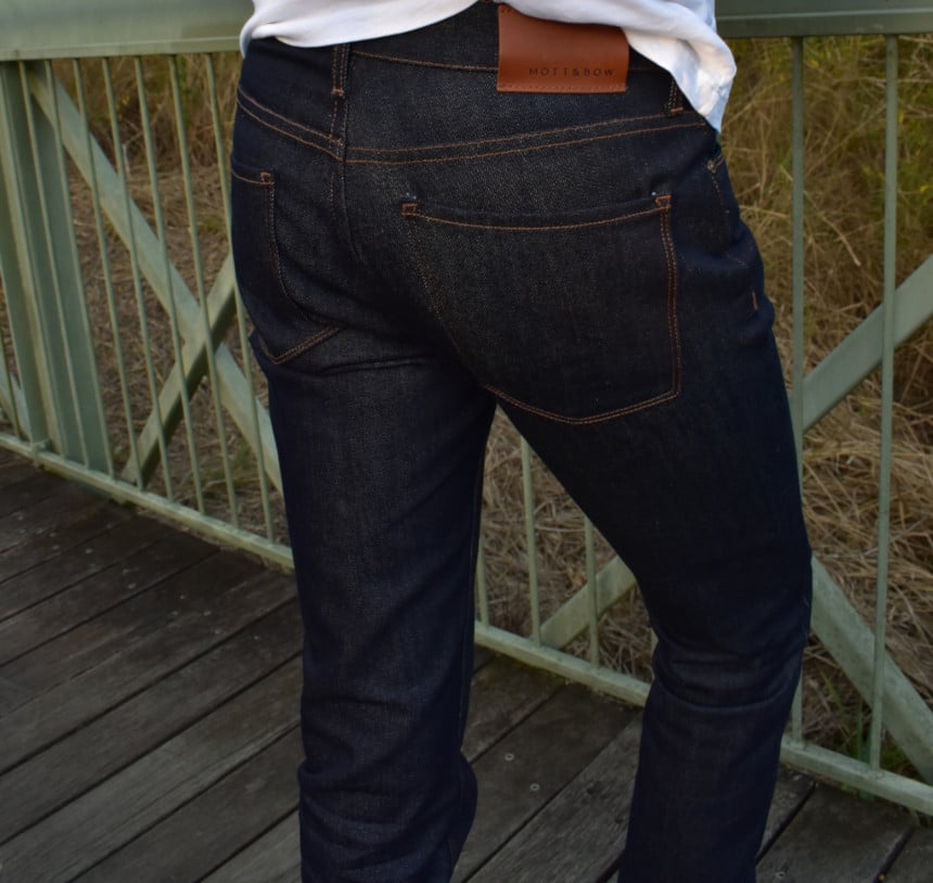 Model Wearing Mott & Bow Slim Nofolk Raw Jean from Behind Showing Tag