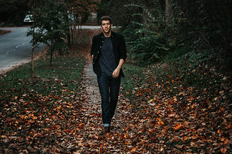 model wearing unbuttoned black oxford from Frank And Oak