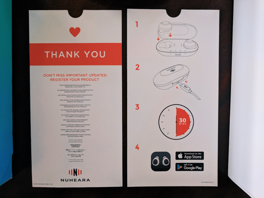 Top down close up Nuheara IQbuds Boost set quick guide and Thank you note