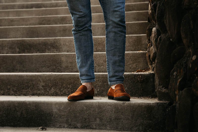 Wolf and Shepherd loafers gold standing on steps